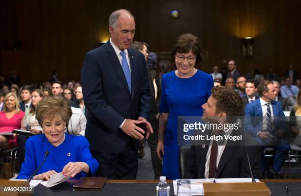 Senator Bob Casey and Senator Susan Collins greet Former Senator Elizabeth Dole and actor, director, and writer Ryan Phillippe prior to the Senate...