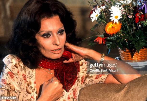 Sofia Loren posing for a photo with Rolex Watch on March 23, 1979 in New York, New York.