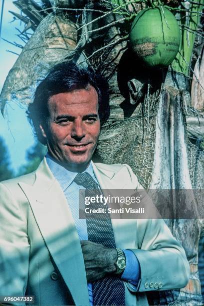 Julio Iglesias posing for a photo with Rolex watch on June 10, 1980 in Miami, Florida.