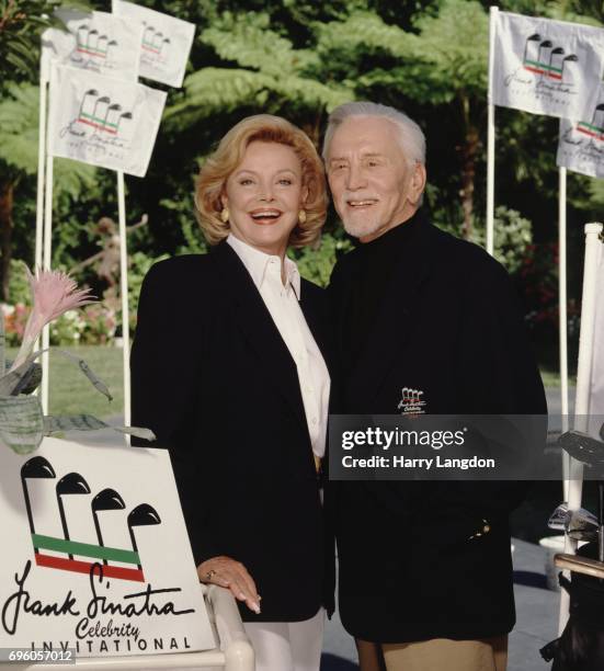 Barbara Sinatra and actor Kirk Douglas pose for a portrait in 1994 in Palm Springs, California.