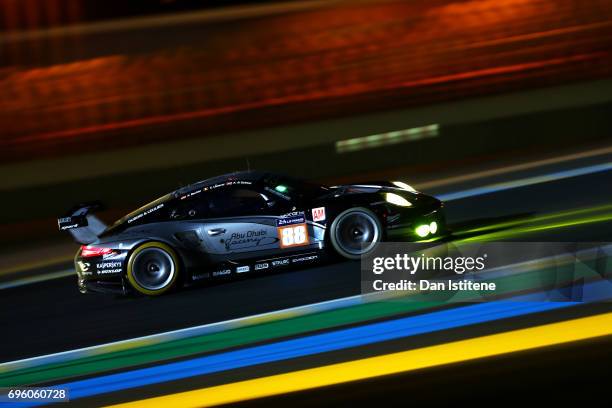 The Proton Competition Porsche of Stephane Lemeret, Klaus Bachler and Khaled Al Qubaisi drives during practice for the Le Mans 24 Hour Race at...