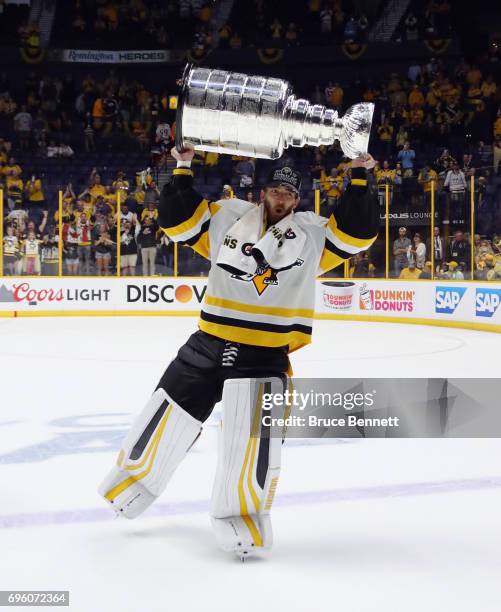 Matt Murray of the Pittsburgh Penguins celebrates with the Stanley Cup following a victory over the Nashville Predators in Game Six of the 2017 NHL...