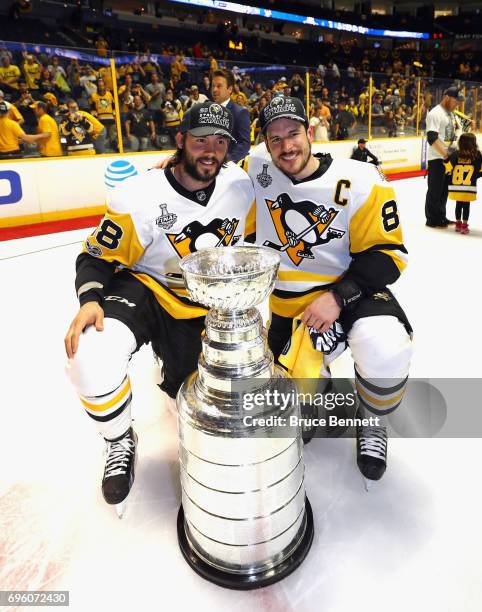 Kris Letang and Sidney Crosby of the Pittsburgh Penguins celebrate with the Stanley Cup following a victory over the Nashville Predators in Game Six...