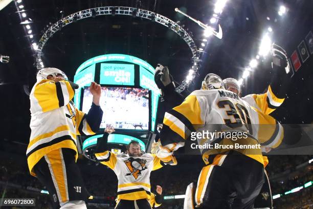 Matt Murray of the Pittsburgh Penguins celebrates with teammates after they defeated the Nashville Predators 2-0 to win the 2017 NHL Stanley Cup...