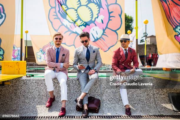 Group of gentleman are seen during Pitti Immagine Uomo 92. At Fortezza Da Basso on June 14, 2017 in Florence, Italy.