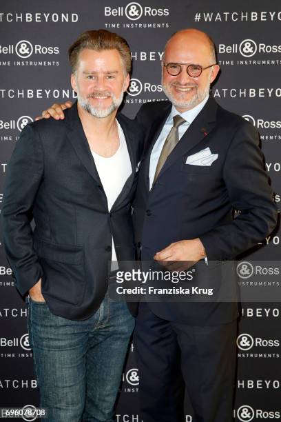 Joern F. Kengelbach, editor in chief Robb Report and Carlos Rosillo, founder and CEO of Bell & Ross, attend the Bell And Ross Cocktail Party In...