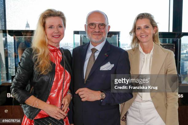 Alexandra Blohm, Becker Jeweler, , Carlos Rosillo, founder and CEO of Bell & Ross and Claudia Gerlach attend the Bell & Ross Cocktail Party at...