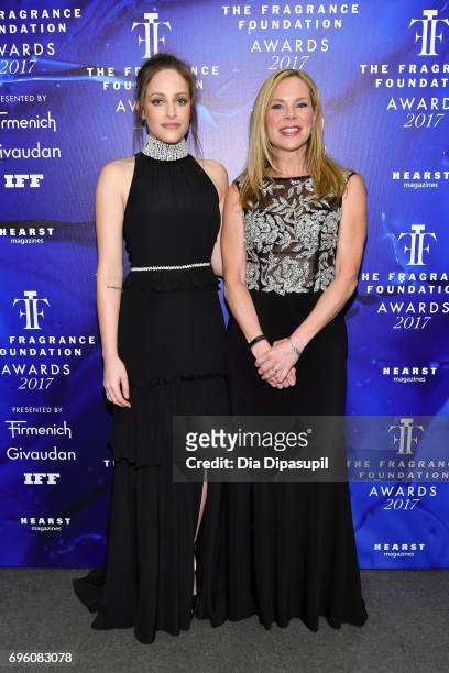 Carly Chaikin and Emily Bond poses backstage at the 2017 Fragrance Foundation Awards Presented By Hearst Magazines at Alice Tully Hall on June 14,...