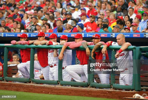 Players on the bench of the Philadelphia Phillies watch the action in the third inning during a game against the Boston Red Sox at Citizens Bank Park...