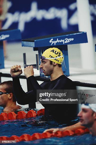 Australian swimmer Ian Thorpe celebrates after finishing in first place in a world record time to win the gold medal for Australia in the Men's 400...