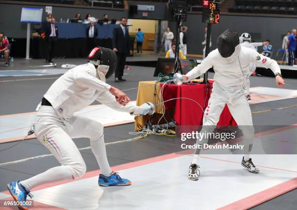 Hugues Bousvert-Simard of Canada fences against John Edison Rodriguez of Colombia during the Men's Epee event on June 14, 2017 at the Pan-American...