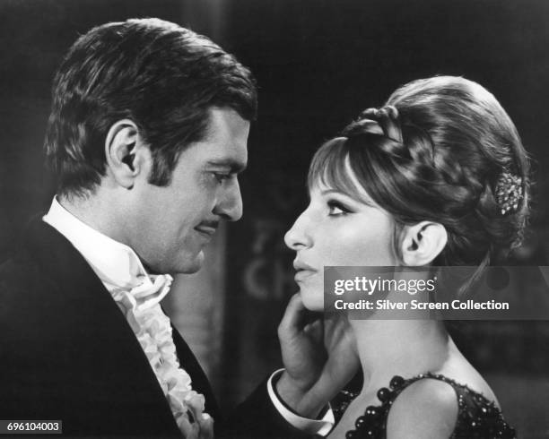 Actors Barbra Streisand as Fanny Brice and Omar Sharif as Nicky Arnstein in the biopic 'Funny Girl', 1968.