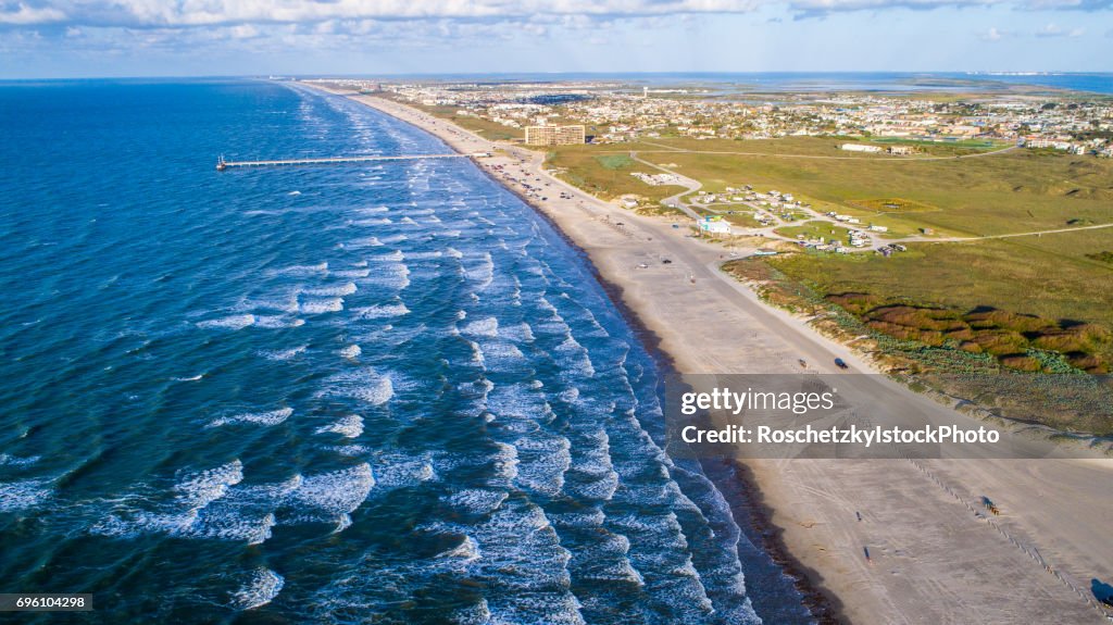 Sunrise on Padre Island from High Drone View with waves crashing along Beach