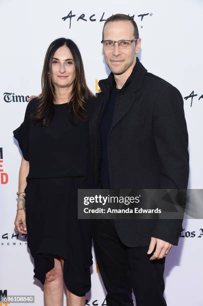 Sidney Kimmel Entertainment President of Production Carla Hacken and writer Gregg Hurwitz attend the opening night premiere of Focus Features' "The...