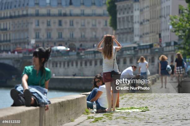 Nice weather with temperatures over 30 C remains in Paris for a least a week. On Friday, June 14 in Paris, France.