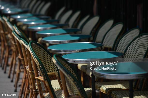 Empty chairs in one of many Cafes near Notre Dame Cathedral in Paris, as visitor numbers dropped in wake of terrorist attacks. The Louvre Museum in...