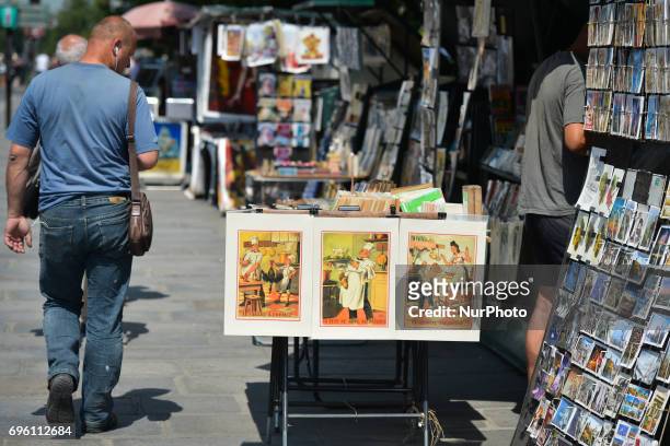 View of stands selling souvenirs and memorabilia along Seine river, near Notre Dame Cathedral in Paris, as visitor numbers dropped in wake of...