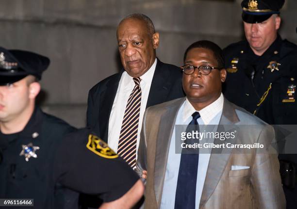 Actor Bill Cosby and Andrew Wyatt are seen leaving the Montgomery County Courthouse as the Bill Cosby trial continues after defense rests on June 14,...
