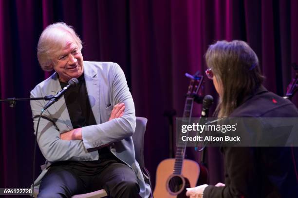 Musician Justin Hayward and Vice President of The GRAMMY Foundation and MusiCares Scott Goldman speak onstage during An Evening With Justin Hayward...