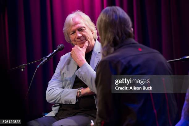 Musician Justin Hayward and Vice President of The GRAMMY Foundation and MusiCares Scott Goldman speak onstage during An Evening With Justin Hayward...