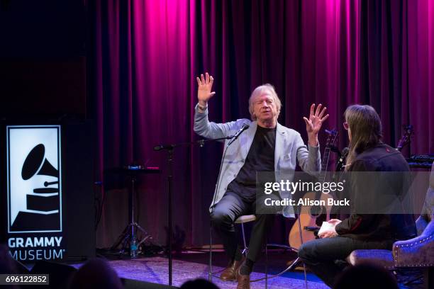 Musician Justin Hayward and Vice President of The GRAMMY Foundation and MusiCares Scott Goldman speak onstage during An Evening With Justin Hayward...