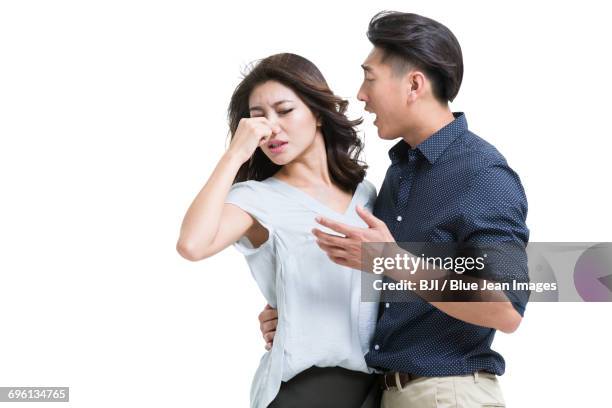 husband with bad breath - 鼻をつまむ ストックフォトと画像