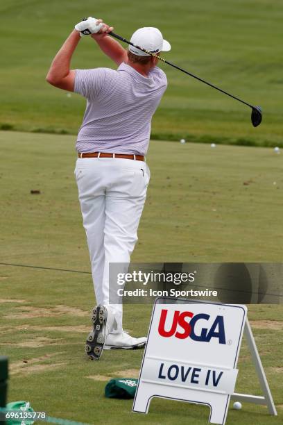 Golfer Davis Love IV hits balls at the practice range during the practice round for the 117th US Open on June 14, 2017 at Erin Hills in Erin,...