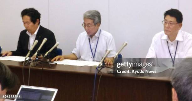 Noboru Sakamoto , senior medical officer of the Kawasaki municipal government, attends a press conference at the municipal government building in...