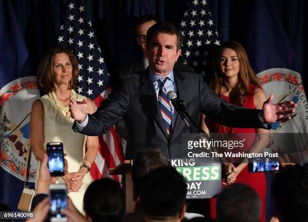 Flanked by family members, Virginia Democratic candidate for Governor Lt. Governor Ralph Northam speaks to his supporters during a primary night...