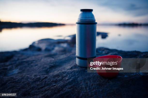 thermos and cup - insulated drink container stock pictures, royalty-free photos & images