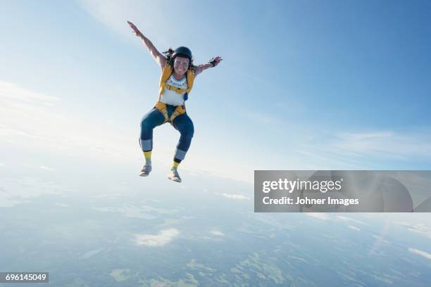 woman skydiving - parachute bildbanksfoton och bilder