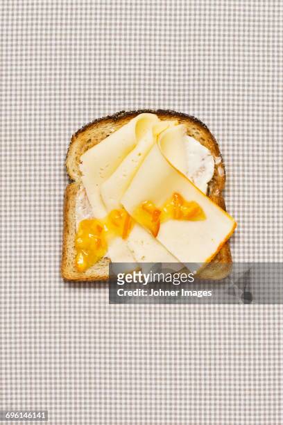 cheese on toast - marmalade sandwich stock pictures, royalty-free photos & images
