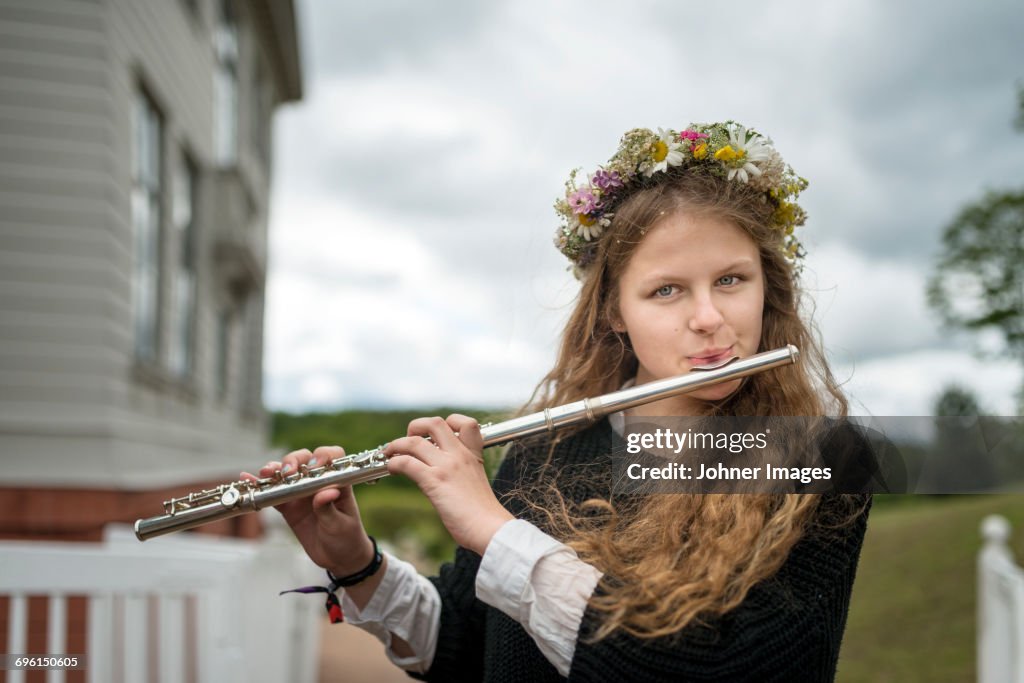 Girl playing transverse flute