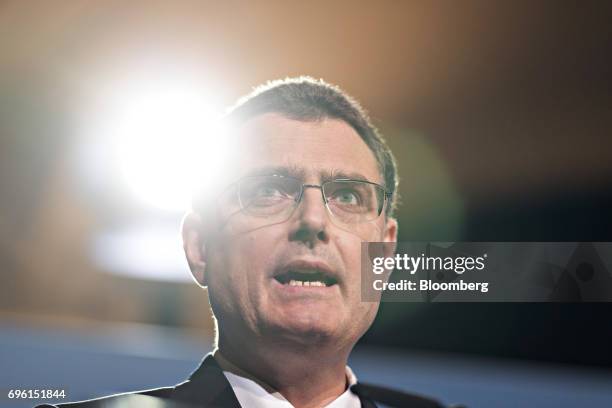 Thomas Jordan, president of the Swiss National Bank , speaks during the bank's rate announcement news conference in Bern, Switzerland, on Thursday,...