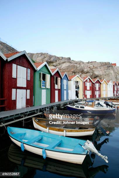 fishing huts and moored boats - archipelago stock pictures, royalty-free photos & images