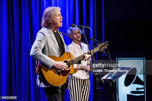 Justin Hayward and Julie Ragins perform during An Evening With Justin Hayward at The GRAMMY Museum on June 14, 2017 in Los Angeles, California.