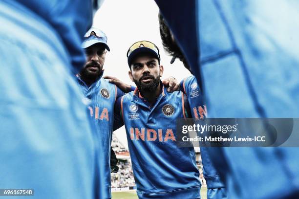 Virat Kohli, captain of India talks to his players ahead of the ICC Champions Trophy Semi Final match between Bangladesh and India at Edgbaston on...