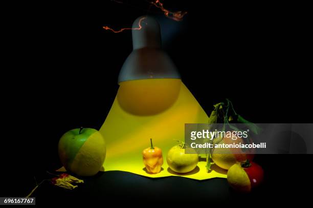 fruit, vegetables and yellow light - raw acrylic ストックフォトと画像