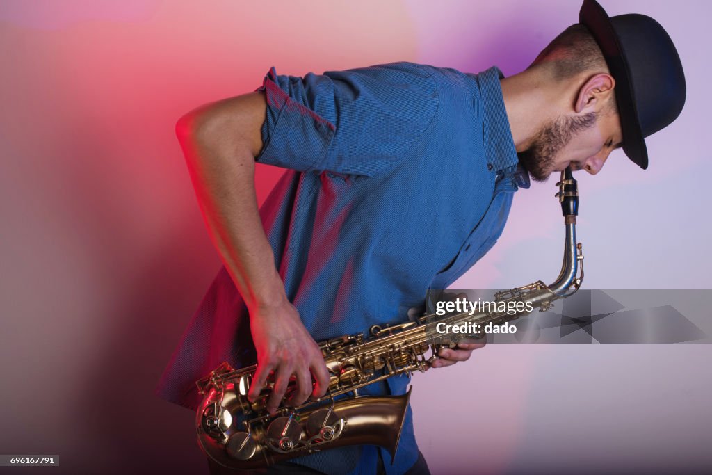 Saxophonist playing his saxophone