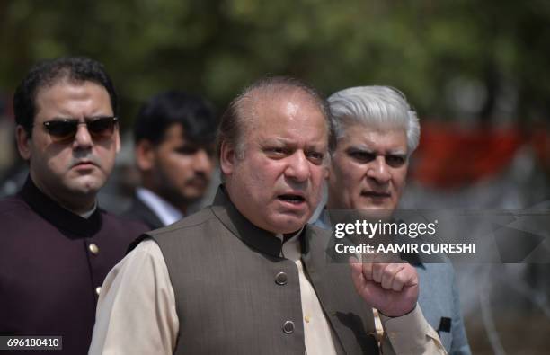 Pakistan's Prime Minister Nawaz Sharif speaks to media after appearing before an anti-corruption commission at the Federal Judicial Academy in...