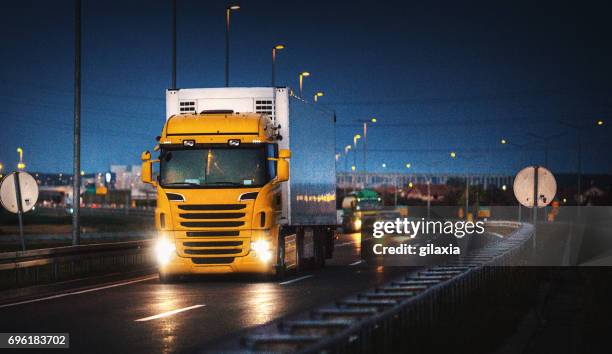 heavy cargo on the road - transport occupation stock pictures, royalty-free photos & images