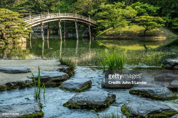Engetsukyo Bridge at Ritsurin - a landscape garden in Takamatsu built by the local feudal lords during the Edo Period. Considered one of the finest...