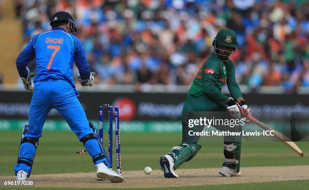 Tamim Iqbal of Bangladesh looks on, after being bowled by Kedar Jadhav of India during the ICC Champions Trophy Semi Final match between Bangladesh...