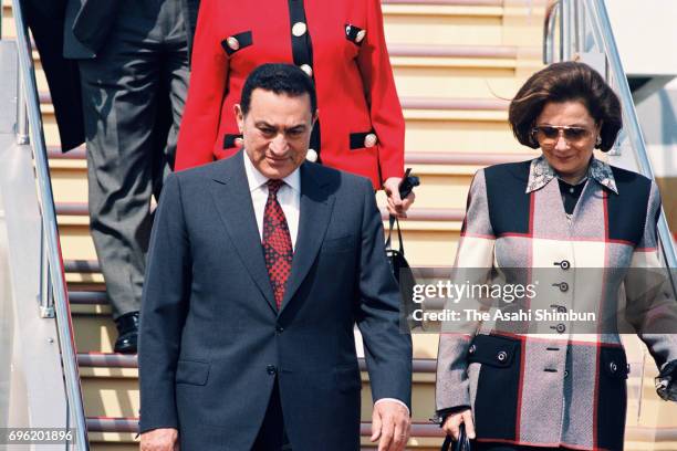 Egyptian President Hosni Mubarak and his wife Suzanne are seen on arrival at Haneda International Airport on March 13, 1995 in Tokyo, Japan.