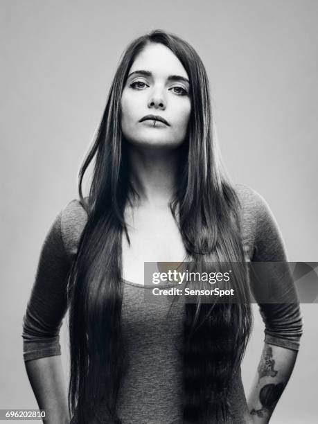 real young woman black and white studio portrait - snob stock pictures, royalty-free photos & images
