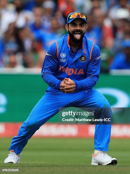 Virat Kohli of India celebrates catching Mushfiqur Rahim of Bangladesh off the bowling of Kedar Jadhav during the ICC Champions Trophy Semi Final...