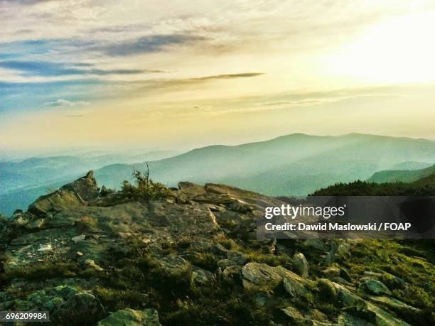 sunlight on mountain - maslowski stock pictures, royalty-free photos & images