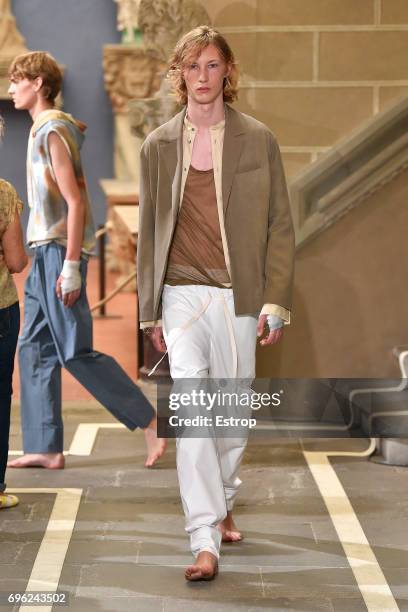 Model walks the runway at the Federico Curradi SS18 show during 92. Pitti Immagine Uomo on June 14, 2017 in Florence, Italy.