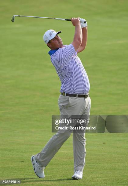 Michael Putnam of the United States plays his shot on the 11th hole during the first round of the 2017 U.S. Open at Erin Hills on June 15, 2017 in...