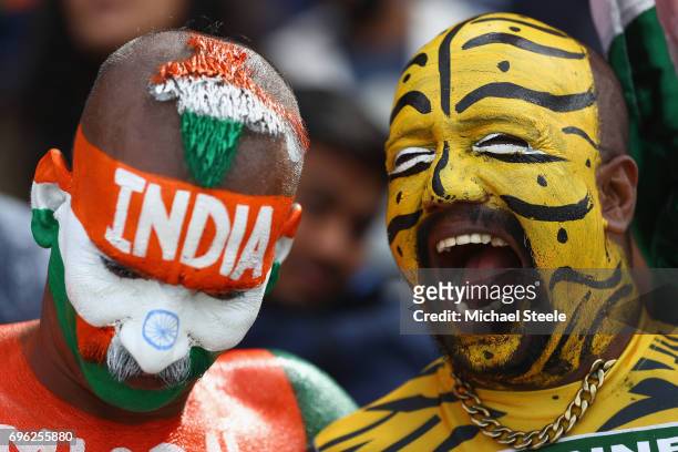 Painted faces of Bangladesh and India supporters look on during the ICC Champions Trophy Semi-Final match between Bangladesh and India at Edgbaston...